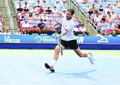 Cameron Norrie of Great Britain plays a forehand against Alex de Minaur of Australia during their Montreal Masters match on Thursday. (AFP) Cameron Norrie of Great Britain plays a forehand against Alex de Minaur of Australia during their Montreal Masters match on Thursday. (AFP)