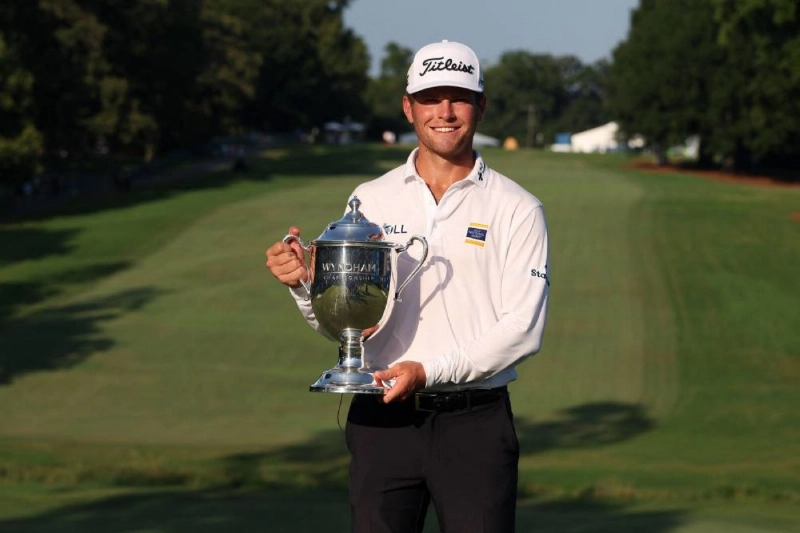 Michael Brennan of the United States poses with the trophy after winning the Wyndham Championship at Sedgefield Country Club in Greensboro, North Carolina. (AFP) Michael Brennan of the United States poses with the trophy after winning the Wyndham Championship at Sedgefield Country Club in Greensboro, North Carolina. (AFP)