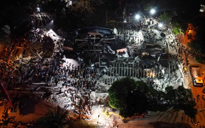 Aerial view of rescue workers and volunteers searching for survivors at the site of collapsed buildings after an earthquake in Cali, Colombia on August 12, 2026. Rescuers, soldiers and volunteers searched through collapsed apartment blocks and office buildings across western Colombia, racing to find survivors after the country's strongest earthquake in a century killed at least 239 people and left many more homeless on August 10, 2026. The 7.4-magnitude quake injured more than 1,670 people, according to a tally by municipal authorities. (AFP) Aerial view of rescue workers and volunteers searching for survivors at the site of collapsed buildings after an earthquake in Cali, Colombia on August 12, 2026. Rescuers, soldiers and volunteers searched through collapsed apartment blocks and office buildings across western Colombia, racing to find survivors after the country's strongest earthquake in a century killed at least 239 people and left many more homeless on August 10, 2026. The 7.4-magnitude quake injured more than 1,670 people, according to a tally by municipal authorities. (AFP)