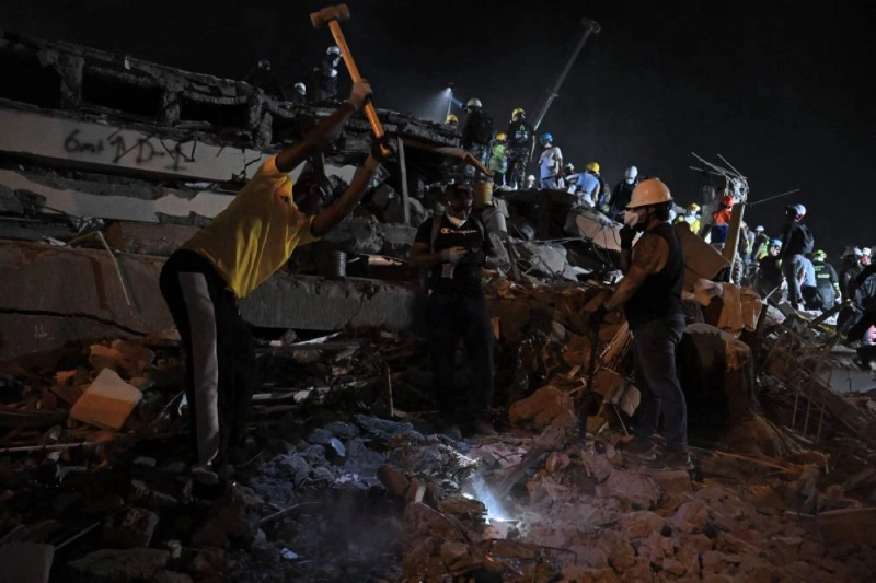 Rescue workers and volunteers remove rubble as they search for survivors at the site of collapsed buildings after an earthquake in Cali, Colombia on August 12, 2026. Rescuers, soldiers and volunteers searched through collapsed apartment blocks and office buildings across western Colombia, racing to find survivors after the country's strongest earthquake in a century killed at least 239 people and left many more homeless on August 10, 2026. The 7.4-magnitude quake injured more than 1,670 people, according to a tally by municipal authorities. (AFP) Rescue workers and volunteers remove rubble as they search for survivors at the site of collapsed buildings after an earthquake in Cali, Colombia on August 12, 2026. Rescuers, soldiers and volunteers searched through collapsed apartment blocks and office buildings across western Colombia, racing to find survivors after the country's strongest earthquake in a century killed at least 239 people and left many more homeless on August 10, 2026. The 7.4-magnitude quake injured more than 1,670 people, according to a tally by municipal authorities. (AFP)