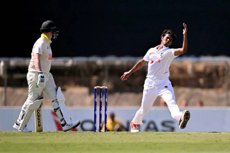 Bangladesh's Hasan Mahmud bowls next to Australian batsman Steve Smith during the first day of the first Test at Marrara Stadium in Darwin on August 13, 2026. (AFP) Bangladesh's Hasan Mahmud bowls next to Australian batsman Steve Smith during the first day of the first Test at Marrara Stadium in Darwin on August 13, 2026. (AFP)