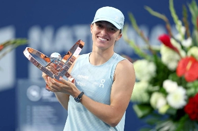 Iga Swiatek of Poland poses with the trophy after defeating Elena Rybaina of Kazakhstan in the WTA 1000 final in Toronto. (AFP) Iga Swiatek of Poland poses with the trophy after defeating Elena Rybaina of Kazakhstan in the WTA 1000 final in Toronto. (AFP)