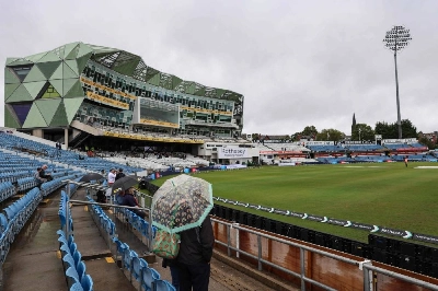 Fans wait as rain delays the start of day two of the first Test match between England and Pakistan at Headingley cricket ground in Leeds:AFP Fans wait as rain delays the start of day two of the first Test match between England and Pakistan at Headingley cricket ground in Leeds:AFP