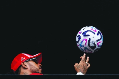 Ferrari's British driver Lewis Hamilton plays with a ball ahead of the Formula One Dutch Grand Prix at The Circuit Zandvoort, western Netherlands, on August 20, 2026. (AFP) Ferrari's British driver Lewis Hamilton plays with a ball ahead of the Formula One Dutch Grand Prix at The Circuit Zandvoort, western Netherlands, on August 20, 2026. (AFP)