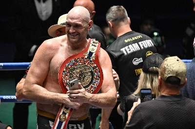 Britain’s Tyson Fury poses with the WBC Metta Humanitarian Belt after defeating Poland’s Mariusz Wach during their heavyweight charity boxing bout in Pattaya on July 24, 2026. (AFP) Britain’s Tyson Fury poses with the WBC Metta Humanitarian Belt after defeating Poland’s Mariusz Wach during their heavyweight charity boxing bout in Pattaya on July 24, 2026. (AFP)