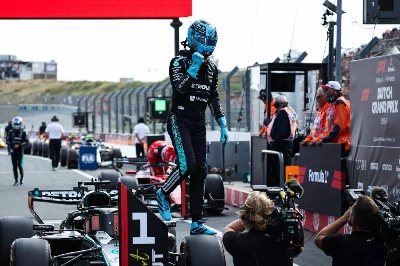 Mercedes' British driver George Russell celebrates his pole position after the sprint qualifying session of the Dutch Grand Prix at The Circuit Zandvoort, western Netherlands, on August 21, 2026. (AFP) Mercedes' British driver George Russell celebrates his pole position after the sprint qualifying session of the Dutch Grand Prix at The Circuit Zandvoort, western Netherlands, on August 21, 2026. (AFP)