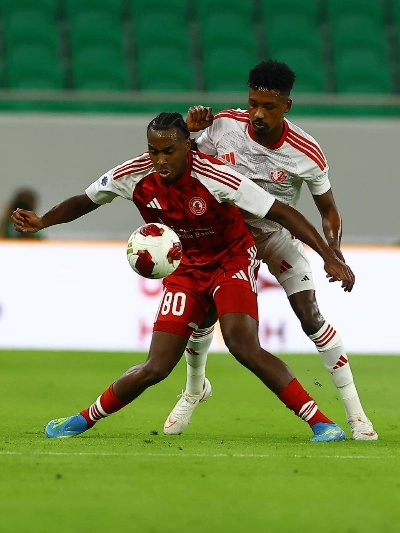 Al Arabi and Al Shamal players battle for the at Al Thumama Stadium. Al Arabi and Al Shamal players battle for the at Al Thumama Stadium.