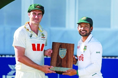Australia’s captain Pat Cummins (left) holds the series trophy with Bangladesh’s Najmul Hossain Shanto after the second day of the second Test at the Great Barrier Reef Stadium in Mackay on August 23, 2026. (AFP) Australia’s captain Pat Cummins (left) holds the series trophy with Bangladesh’s Najmul Hossain Shanto after the second day of the second Test at the Great Barrier Reef Stadium in Mackay on August 23, 2026. (AFP)