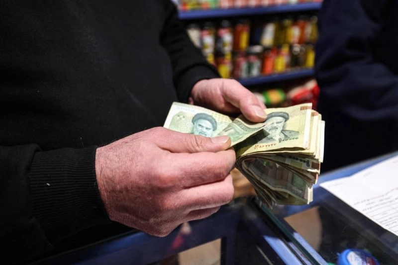 A shop owner counts Iranian banknotes at a store in Tehran. The rial was trading on the black market on Monday at over 2mn against the US dollar, according to websites that track those figures. Before the war, it traded at around 1.7mn to the dollar, while in late April, just over two months into the war, it hit a then-record low of 1.8mn A shop owner counts Iranian banknotes at a store in Tehran. The rial was trading on the black market on Monday at over 2mn against the US dollar, according to websites that track those figures. Before the war, it traded at around 1.7mn to the dollar, while in late April, just over two months into the war, it hit a then-record low of 1.8mn