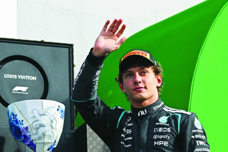 Mercedes' Italian driver Kimi Antonelli celebrates on the podium after the Formula One Dutch Grand Prix at The Circuit Zandvoort, western Netherlands, on August 23, 2026. (AFP) Mercedes' Italian driver Kimi Antonelli celebrates on the podium after the Formula One Dutch Grand Prix at The Circuit Zandvoort, western Netherlands, on August 23, 2026. (AFP)