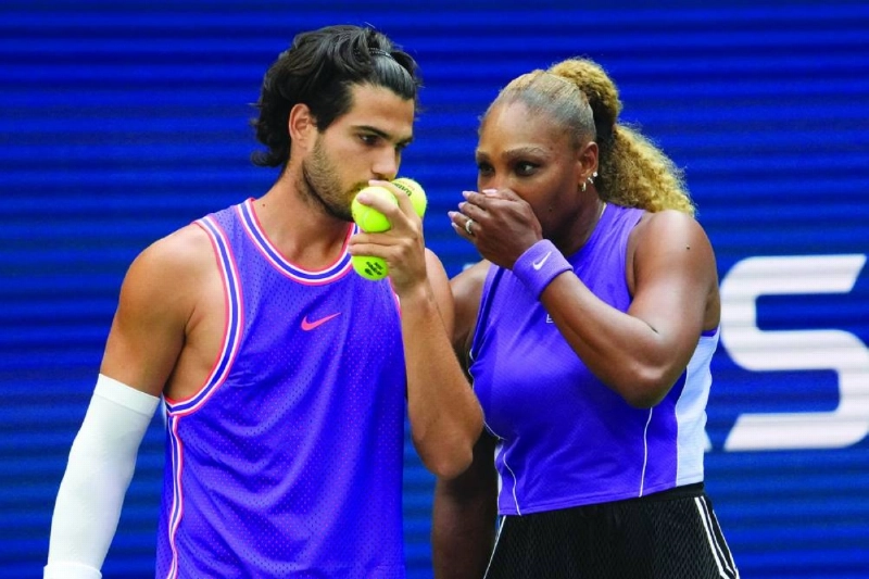 Spain's Carlos Alcaraz and USA's Serena Williams confer during the US Open mixed doubles match in New York. (AFP) Spain's Carlos Alcaraz and USA's Serena Williams confer during the US Open mixed doubles match in New York. (AFP)