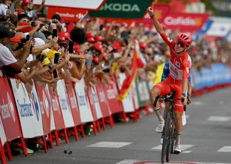 Slovenian rider Tadej Pogacar celebrates as he crosses first the finish line of the sixth stage of the Vuelta a Espana 2026, a 177,4 km race between Alcossebre and Castellon de la Plana on August 27, 2026. (AFP) Slovenian rider Tadej Pogacar celebrates as he crosses first the finish line of the sixth stage of the Vuelta a Espana 2026, a 177,4 km race between Alcossebre and Castellon de la Plana on August 27, 2026. (AFP)