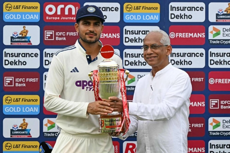 India's captain Shubman Gill (left) receives the trophy from Sri Lankan Cricket Transformation Committee Chairman Eran Wickramaratne in the end of the fifth day of the second Test against Sri Lanka at the Sinhalese Sports Club Ground in Colombo on August 27, 2026. (AFP) India's captain Shubman Gill (left) receives the trophy from Sri Lankan Cricket Transformation Committee Chairman Eran Wickramaratne in the end of the fifth day of the second Test against Sri Lanka at the Sinhalese Sports Club Ground in Colombo on August 27, 2026. (AFP)