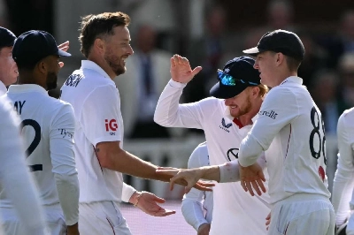 England's Ollie Robinson (second left) celebrates with teammates after taking the wicket of Pakistan's Khurram Shahzad on day two of the second Test at Lord's cricket ground in London on August 28, 2026. (AFP) England's Ollie Robinson (second left) celebrates with teammates after taking the wicket of Pakistan's Khurram Shahzad on day two of the second Test at Lord's cricket ground in London on August 28, 2026. (AFP)