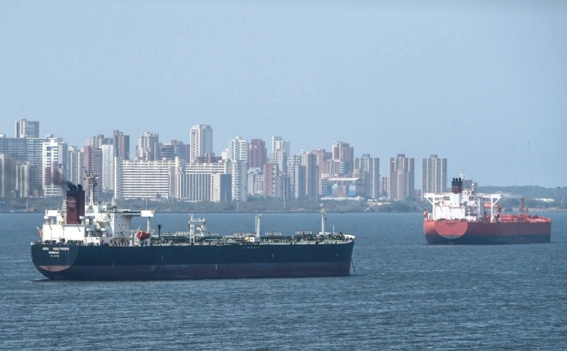 Oil tankers sail the Maracaibo Lake in Maracaibo, Venezuela (file). The country has the world's largest proven oil reserves, but it produces only about 1.25mn bpd — far below its potential — after years of underinvestment, mismanagement and sanctions. Oil tankers sail the Maracaibo Lake in Maracaibo, Venezuela (file). The country has the world's largest proven oil reserves, but it produces only about 1.25mn bpd — far below its potential — after years of underinvestment, mismanagement and sanctions.