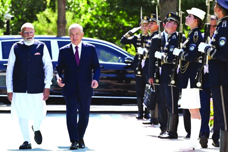In this handout photograph taken and released by the Uzbek Presidential Press Service on August 30, 2026, Uzbekistan's President Shavkat Mirziyoyev (2nd L) welcomes India’s Prime Minister Narendra Modi (L) prior to their talks in Tashkent. (Photo by Handout / Uzbek Presidential Press Service / AFP) / RESTRICTED TO EDITORIAL USE - MANDATORY CREDIT "AFP PHOTO / UZBEK PRESIDENTIAL PRESS SERVICE" - NO MARKETING NO ADVERTISING CAMPAIGNS - DISTRIBUTED AS A SERVICE TO CLIENTS In this handout photograph taken and released by the Uzbek Presidential Press Service on August 30, 2026, Uzbekistan's President Shavkat Mirziyoyev (2nd L) welcomes India’s Prime Minister Narendra Modi (L) prior to their talks in Tashkent. (Photo by Handout / Uzbek Presidential Press Service / AFP) / RESTRICTED TO EDITORIAL USE - MANDATORY CREDIT "AFP PHOTO / UZBEK PRESIDENTIAL PRESS SERVICE" - NO MARKETING NO ADVERTISING CAMPAIGNS - DISTRIBUTED AS A SERVICE TO CLIENTS