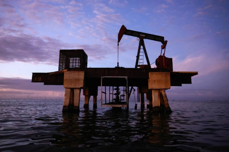 An oil pumpjack at Lake Maracaibo in Cabimas, Venezuela. According to Venezuelan interim President Rodriguez, the pact will last at least 25 years, in line with the Opec country's Hydrocarbons Law, securing $100bn in investment and $209.3bn in royalties and taxes, which would leave some $19in Venezuela's hands from each barrel produced. An oil pumpjack at Lake Maracaibo in Cabimas, Venezuela. According to Venezuelan interim President Rodriguez, the pact will last at least 25 years, in line with the Opec country's Hydrocarbons Law, securing $100bn in investment and $209.3bn in royalties and taxes, which would leave some $19in Venezuela's hands from each barrel produced.