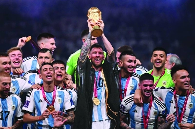 A file photo shows Argentina's captain Lionel Messi lifts the FIFA World Cup trophy as he celebrates with teammates after they won the Qatar 2022 World Cup final against France at Lusail Stadium on December 18, 2022. Messi announced on August 31, 2026, that he is retiring from the Argentina national team, almost a month and a half after losing the 2026 World Cup final to Spain. (AFP) A file photo shows Argentina's captain Lionel Messi lifts the FIFA World Cup trophy as he celebrates with teammates after they won the Qatar 2022 World Cup final against France at Lusail Stadium on December 18, 2022. Messi announced on August 31, 2026, that he is retiring from the Argentina national team, almost a month and a half after losing the 2026 World Cup final to Spain. (AFP)