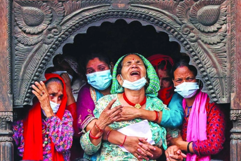 Relatives of Nakul Sharma, 36, who lost his life in the deadly flash floods and a mudslide, mourn during his cremation rituals on the premises of Pashupatinath Temple in Kathmandu, Nepal, September 1, 2026. REUTERS/Athit Perawongmetha TPX IMAGES OF THE DAY Relatives of Nakul Sharma, 36, who lost his life in the deadly flash floods and a mudslide, mourn during his cremation rituals on the premises of Pashupatinath Temple in Kathmandu, Nepal, September 1, 2026. REUTERS/Athit Perawongmetha TPX IMAGES OF THE DAY