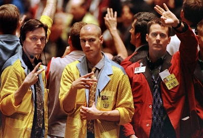 Clerks at the edge of the Treasury bond futures pit at the Chicago Board of Trade signal prices (file). Government borrowing costs from the US to Germany and Japan are at or near multi-decade peaks on heightened worries about inflation and rising interest rates, along with nagging anxiety about their debt loads. Clerks at the edge of the Treasury bond futures pit at the Chicago Board of Trade signal prices (file). Government borrowing costs from the US to Germany and Japan are at or near multi-decade peaks on heightened worries about inflation and rising interest rates, along with nagging anxiety about their debt loads.
