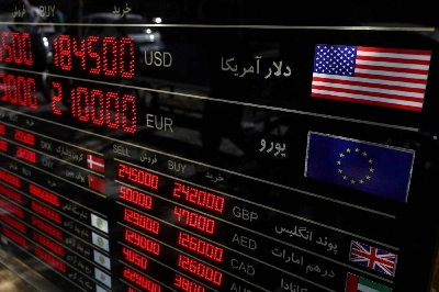 A display of currency exchange information in the Grand Bazaar in Tehran on August 17. The currency has collapsed in value from around 1mn rials to the dollar a year ago to over 2.2mn rials now. A display of currency exchange information in the Grand Bazaar in Tehran on August 17. The currency has collapsed in value from around 1mn rials to the dollar a year ago to over 2.2mn rials now.
