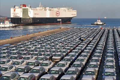 (FILES) This photo taken on January 10, 2024 shows electric cars for export waiting to be loaded on the "BYD Explorer NO.1", a domestically manufactured vessel intended to export Chinese automobiles, at Yantai port, in eastern China's Shandong province. Leading Chinese electric car maker BYD's vehicle sales surged in 2024, the company said in a statement, as the firm grows its overseas presence. (Photo by AFP) / China OUT (FILES) This photo taken on January 10, 2024 shows electric cars for export waiting to be loaded on the "BYD Explorer NO.1", a domestically manufactured vessel intended to export Chinese automobiles, at Yantai port, in eastern China's Shandong province. Leading Chinese electric car maker BYD's vehicle sales surged in 2024, the company said in a statement, as the firm grows its overseas presence. (Photo by AFP) / China OUT