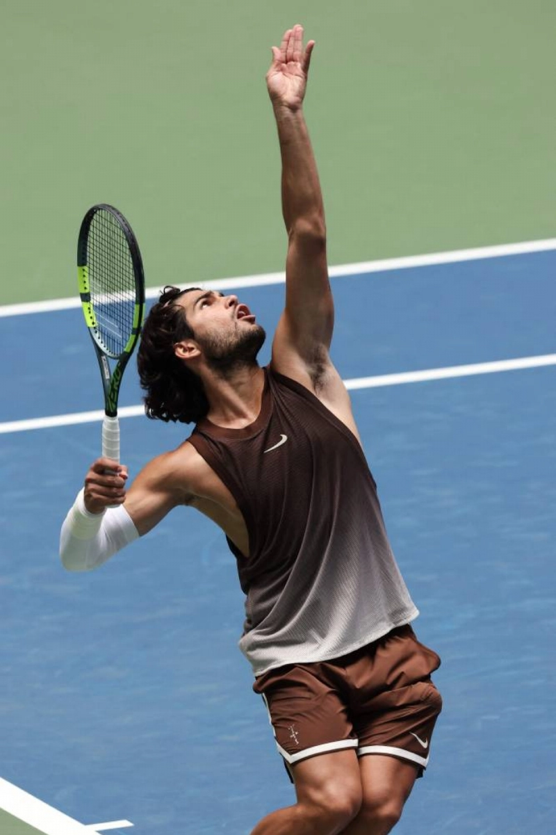 Carlos Alcaraz of Spain serves to Roman Safiullin during their Men's Singles First Round match on Day Two of the 2026 US Open at USTA Billie Jean King National Tennis Center on August 31, 2026 (AFP). Carlos Alcaraz of Spain serves to Roman Safiullin during their Men's Singles First Round match on Day Two of the 2026 US Open at USTA Billie Jean King National Tennis Center on August 31, 2026 (AFP).