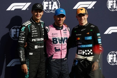Alpine's Pierre Gasly celebrates after qualifying in pole position along with second placed Mercedes' George Russell and third placed McLaren's Oscar Piastri at the Autodromo Nazionale Monza in Italy on September 5, 2026. (AFP) Alpine's Pierre Gasly celebrates after qualifying in pole position along with second placed Mercedes' George Russell and third placed McLaren's Oscar Piastri at the Autodromo Nazionale Monza in Italy on September 5, 2026. (AFP)
