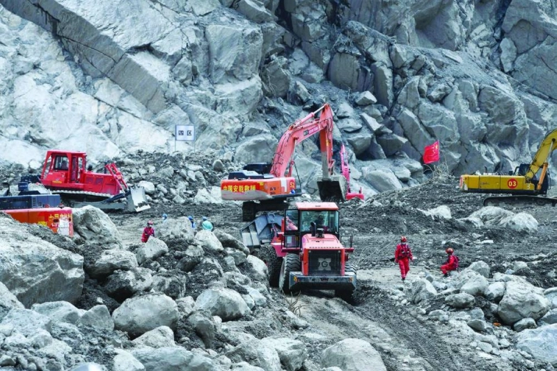 Excavators work during recovery efforts at the site of the destroyed Gyirong Port border crossing in Gyirong County, in China’s western Tibet region, yesterday. (AFP) Excavators work during recovery efforts at the site of the destroyed Gyirong Port border crossing in Gyirong County, in China’s western Tibet region, yesterday. (AFP)