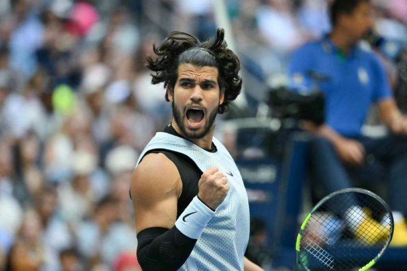 Carlos Alcaraz reacts as he plays USA's Tommy Paul in their men's singles round of 16 tennis match on day eight of the US Open tennis tournament (AFP) Carlos Alcaraz reacts as he plays USA's Tommy Paul in their men's singles round of 16 tennis match on day eight of the US Open tennis tournament (AFP)