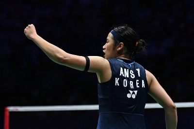 An Se-young celebrates winning the women's singles final against Japan’s Tomoka Miyazaki at the China Masters badminton tournament in Shenzhen (AFP) An Se-young celebrates winning the women's singles final against Japan’s Tomoka Miyazaki at the China Masters badminton tournament in Shenzhen (AFP)
