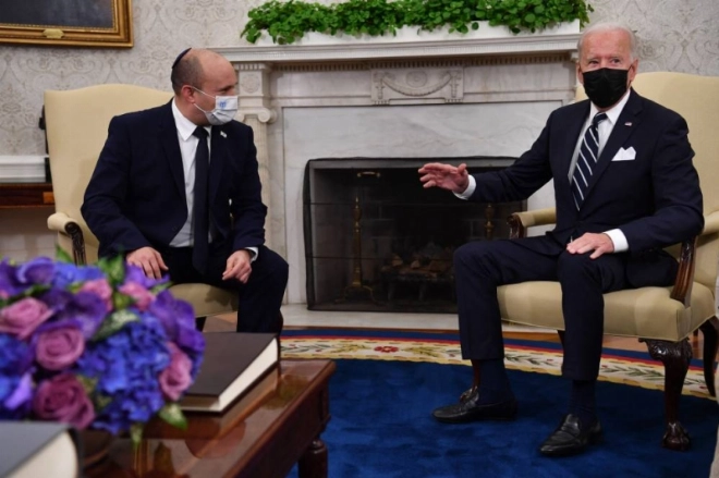 US President Joe Biden meets with Israeli Prime Minister Naftali Bennett in the Oval Office of the White House in Washington, DC, on August 27, 2021. (Photo by Nicholas Kamm / AFP)