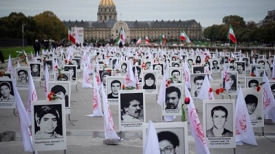 Compétence universelle. Des manifestants iraniens demandant justice pour les victimes