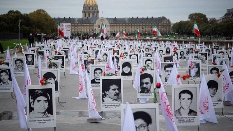 Compétence universelle. Des manifestants iraniens demandant justice pour les victimes