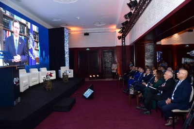 Le Président israélien Isaac Herzog prononçant, à distance, son discours au Global Investment Forum.