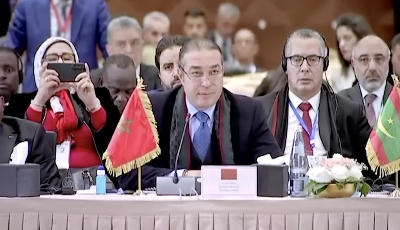 Mohamed Ouzzine prenant la parole à la 17e session de la réunion de l’Union des pays membres de L'Organisation de Coopération Islamique (OCI)