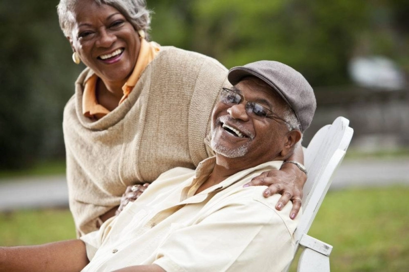 Portrait of stylish senior African American couple. Focus on man (60s).