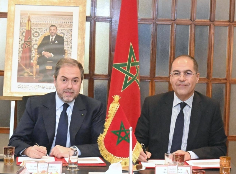 Hamid Addou, président directeur général de Royal Air Maroc et Khalid Safir, directeur général de la CDG.