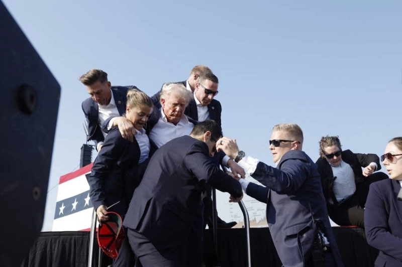 Donald Trump au moment de son évacuation. Photo AFP