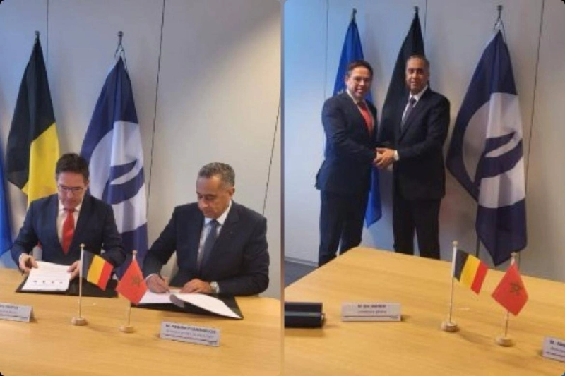 Abdellatif Hammouchi signant le plan d'action avec Éric Snoeck