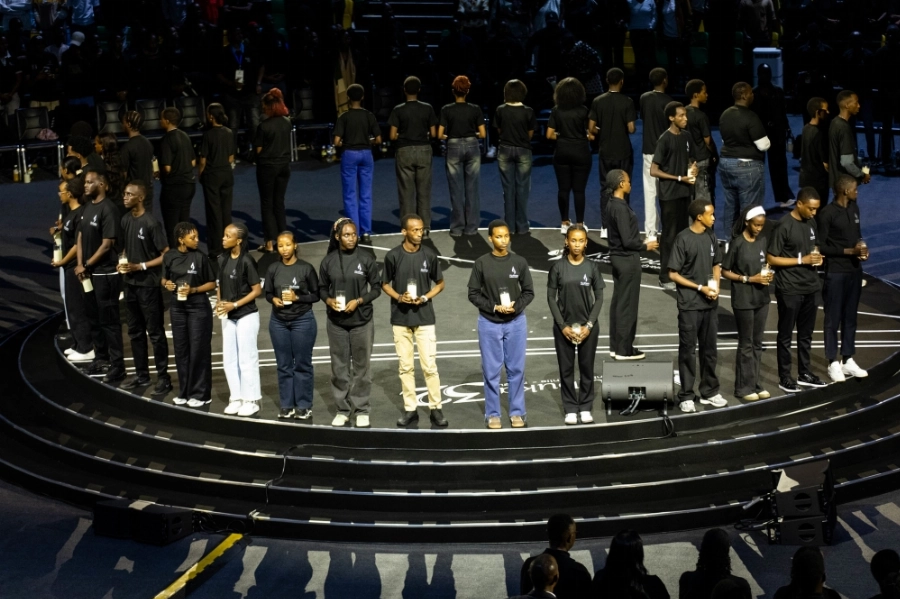 Thousands of mourners observe a moment of silence during a Night Vigil was held in remembrance of the genocide, which claimed more than one million lives in between April and July 1994. Thousands of mourners observe a moment of silence during a Night Vigil was held in remembrance of the genocide, which claimed more than one million lives in between April and July 1994.