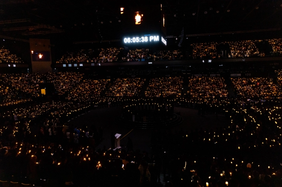 Thousands of mourners observe a moment of silence during a Night Vigil was held in remembrance of the genocide, which claimed more than one million lives in between April and July 1994. Thousands of mourners observe a moment of silence during a Night Vigil was held in remembrance of the genocide, which claimed more than one million lives in between April and July 1994.