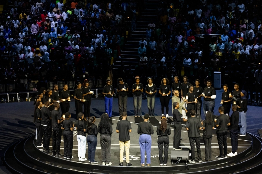 Mourners observe a moment of silence during a night of vigil at BK Arena on Tuesday, April 7. Photo by Dan Gatsinzi Mourners observe a moment of silence during a night of vigil at BK Arena on Tuesday, April 7. Photo by Dan Gatsinzi