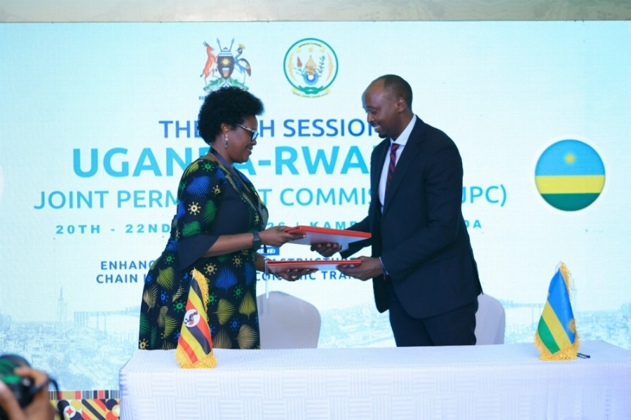 Rwanda’s Minister of Health, Sabin Nsanzimana, and Ugandan State Minister for Primary Healthcare, ,Margaret Muhanga Mugisa sign the Memorandum of Understanding (MoU) on April 22. Rwanda’s Minister of Health, Sabin Nsanzimana, and Ugandan State Minister for Primary Healthcare, ,Margaret Muhanga Mugisa sign the Memorandum of Understanding (MoU) on April 22.