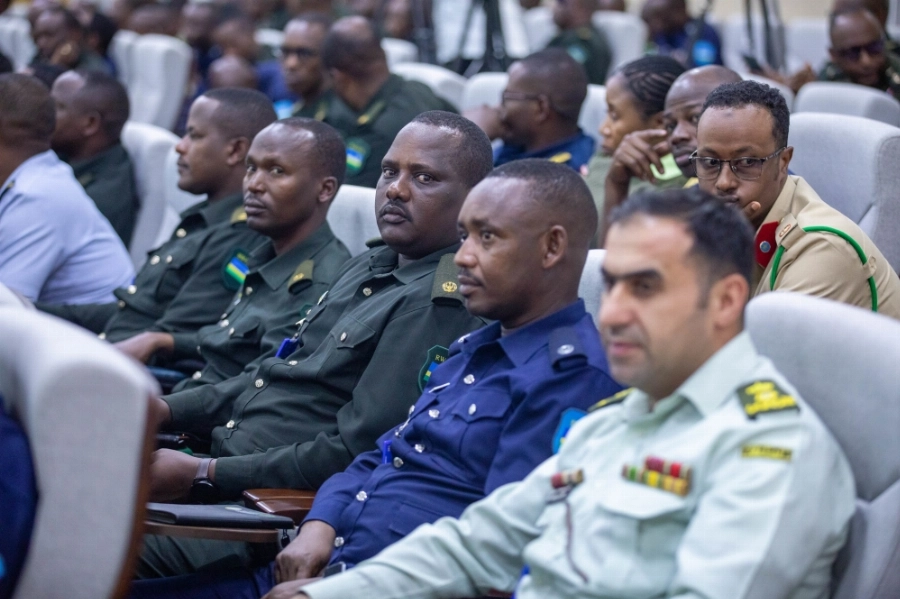 Officers and other delegates follow a panel discussion during the event. Photo by Craish BAHIZI Officers and other delegates follow a panel discussion during the event. Photo by Craish BAHIZI
