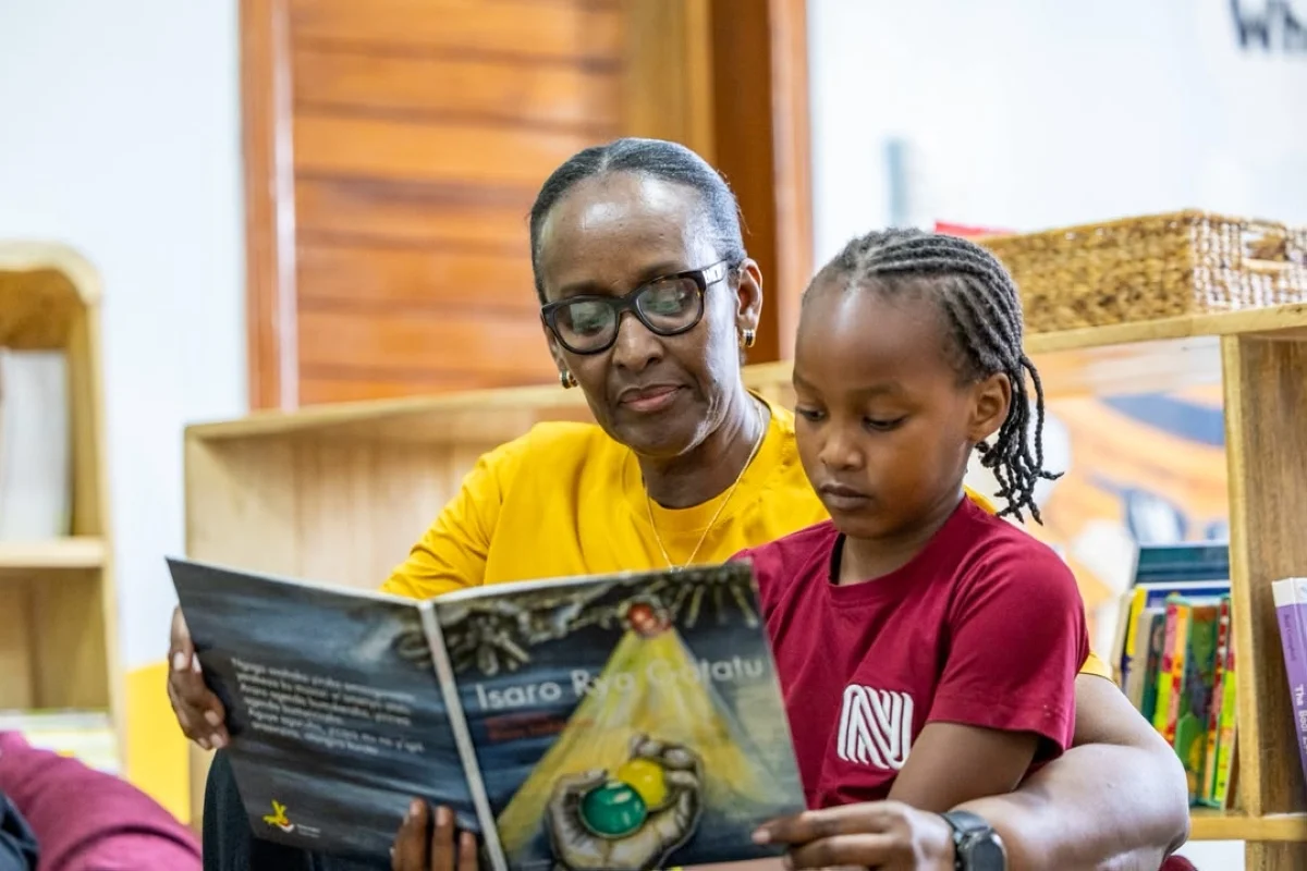 First Lady Jeannette Kagame helps a child to read a book during the inauguration of the first Imbuto Hub in Nyamata, Bugesera District, on Friday, July 24. Photos by Olivier Mugwiza First Lady Jeannette Kagame helps a child to read a book during the inauguration of the first Imbuto Hub in Nyamata, Bugesera District, on Friday, July 24. Photos by Olivier Mugwiza