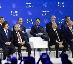 Saudi Foreign Minister Prince Faisal bin Farhan signs the founding charter of the Board of Peace.