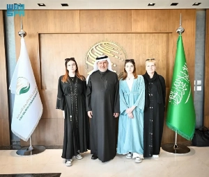 Dr. Abdullah Al-Rabeeah, Advisor at the Royal Court and Supervisor General of the King Salman Humanitarian Aid and Relief Center, receives the separated Polish conjoined twins - Olga and Daria Kołacz - at the center's headquarters in Riyadh on Monday.