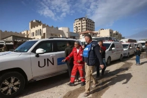 On February 3, 2026, World Health Organization personnel help evacuate Palestinian patients and war-wounded people through the Rafah crossing for treatment abroad.