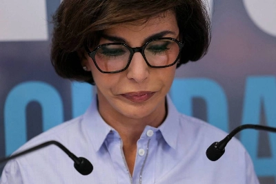TOPSHOT - Right-wing Les Republicains (LR) party candidate in Paris, Rachida Dati delivers a speech following the results of the first round of France's 2026 municipal elections in Paris on March 15, 2026. (Photo by Thomas SAMSON / AFP)